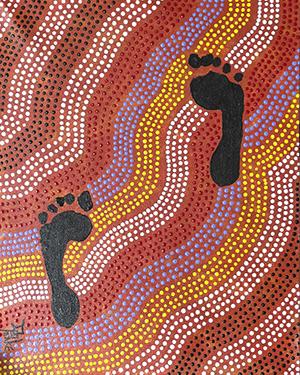 Indigenous artwork featuring two footprints over wavy lines made of dots